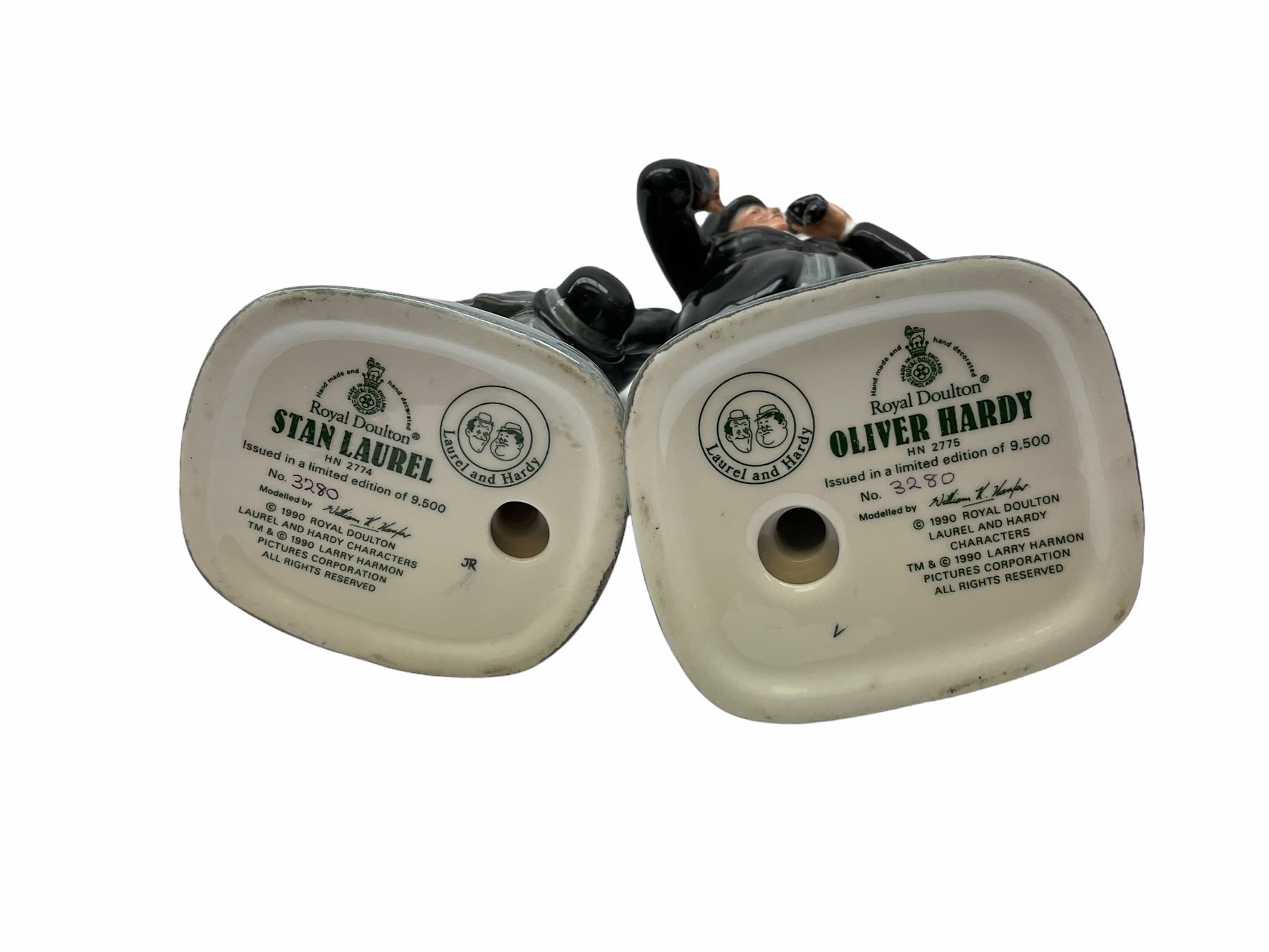 Two limited edition Royal Doulton figures, Stan Laurel HN2774 3,280/9,500, and Oliver Hardy HN2775 3,280/9,500