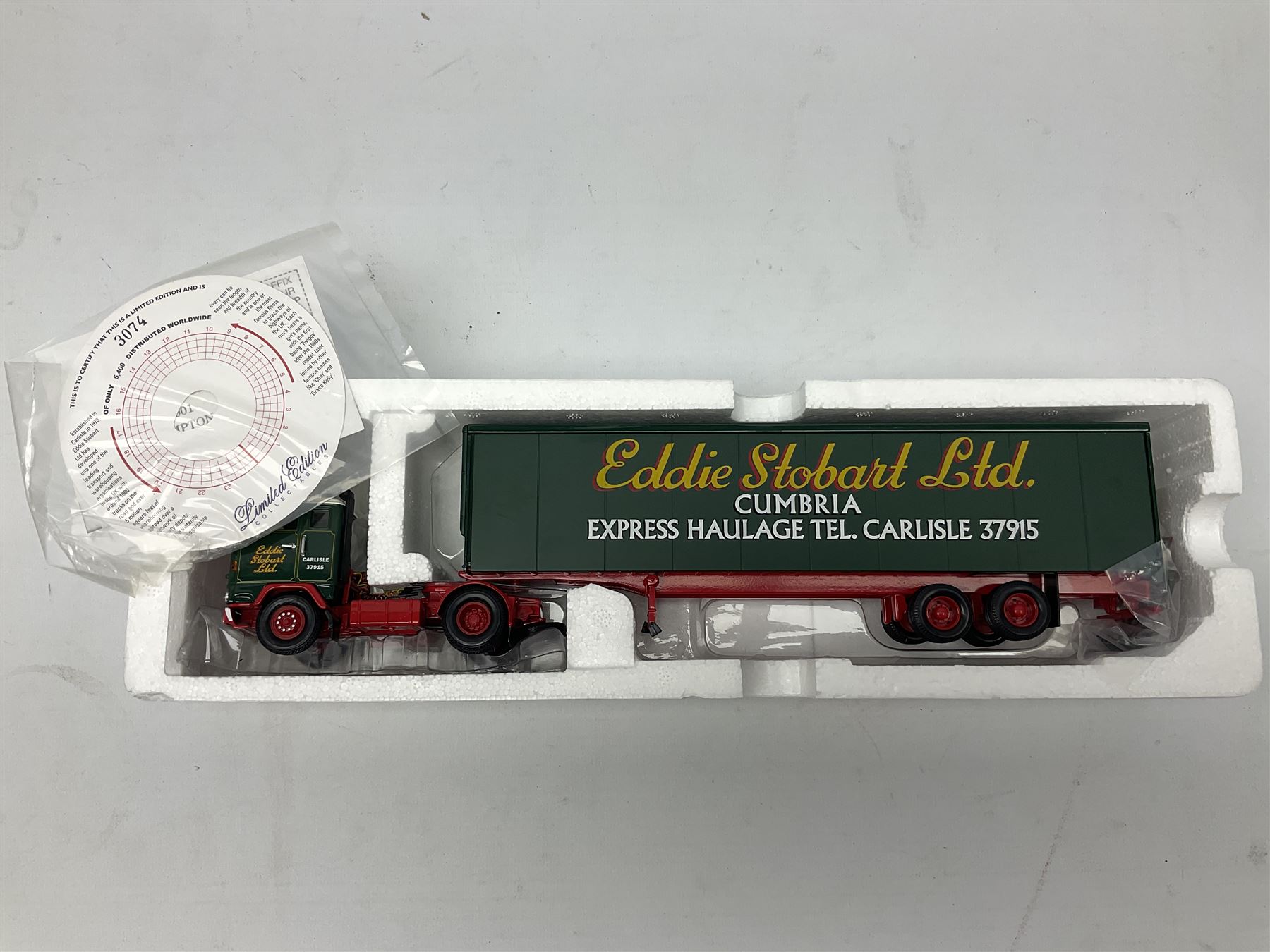 Corgi Eddie Stobart - three limited edition lorries; CC12901 Scania Topline Curtainside; CC13101 Volvo F88 Box Trailer; and CC13207 DAF XF Space Cab & Flatbed Trailer; all boxed (3)
