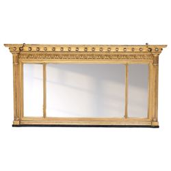 Regency period gilt and gesso framed tripartite overmantel mirror, projecting cavetto corn...