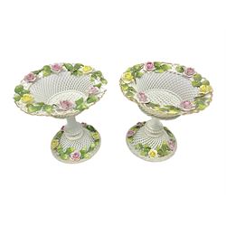 Pair of German Schierholz comports, with open weave baskets encrusted with roses, both with mark beneath, H15cm 