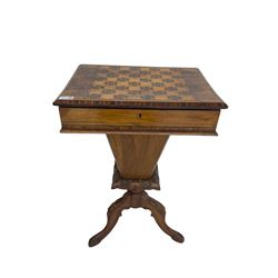 Victorian walnut work table, the rectangular hinged top inlaid with a chessboard design, canted edge with alternating ebony and satinwood inlays, concealing fitted interior, banded and strung frieze over tapering column well, collar carved with foliate decoration, on a cabriole tripod base