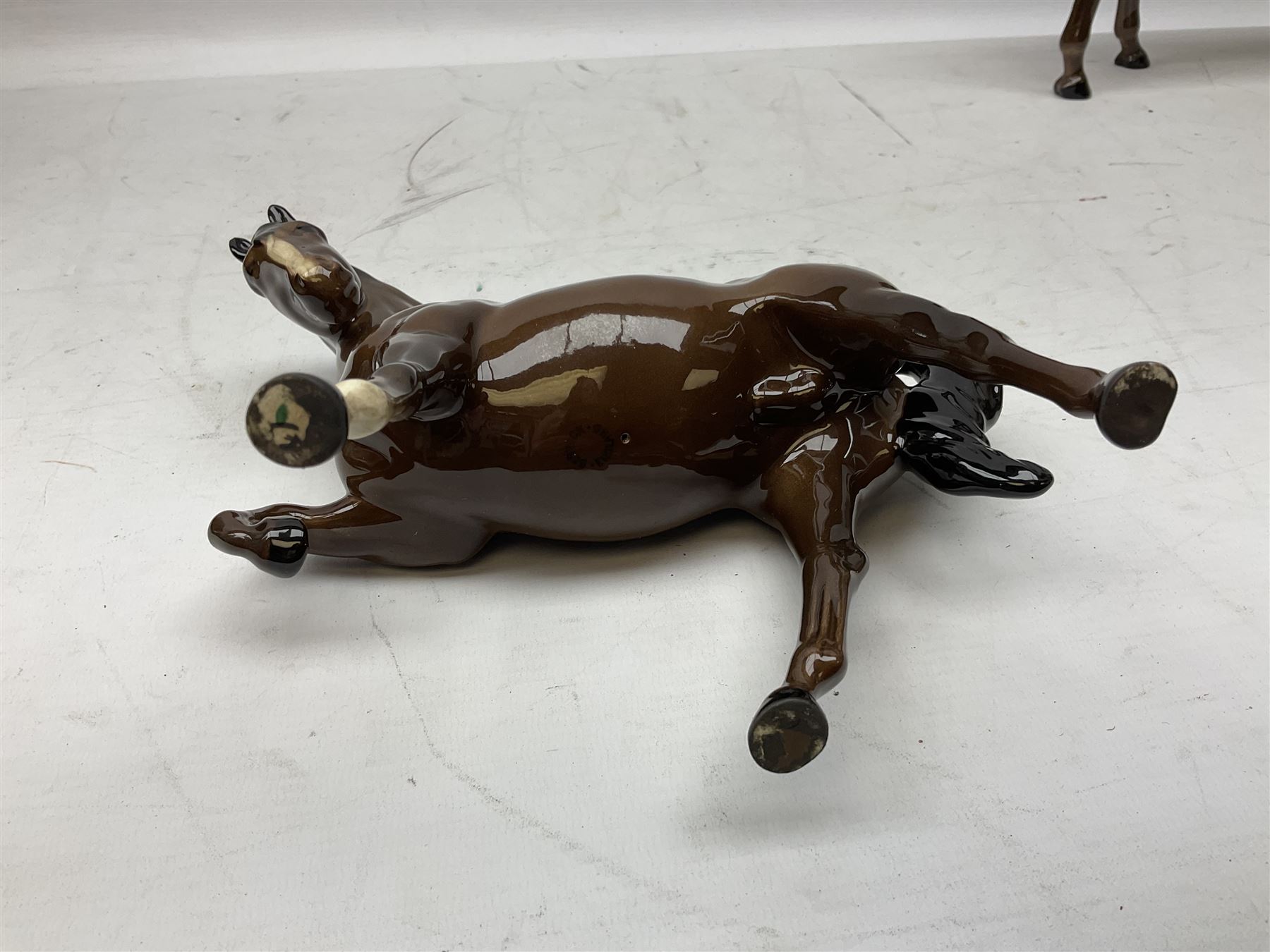 Six Beswick figures of bay horses, including large hunter no.1734, Shire horse no.818, horse with tucked head no.1549, etc (6)