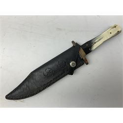 Large Bowie knife the 21cm steel blade marked J.E. Middleton & Sons Rockingham Street Sheffield with brass cross-piece and polished horn grip scales; in leather sheath L36cm overall