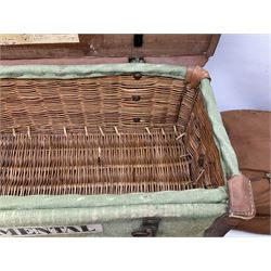 WW2 British Army RAMC 'Regimental Medical Pannier', well marked externally and dated 1941, stamped May 1943 internally, canvas covered wicker form with leather edges, hinged top and fall front with two rope carrying handles, fitted iron locking straps with securing chains; contains various unused field dressings and bandages with WW2 dates and two pillows; original label under lid L79cm