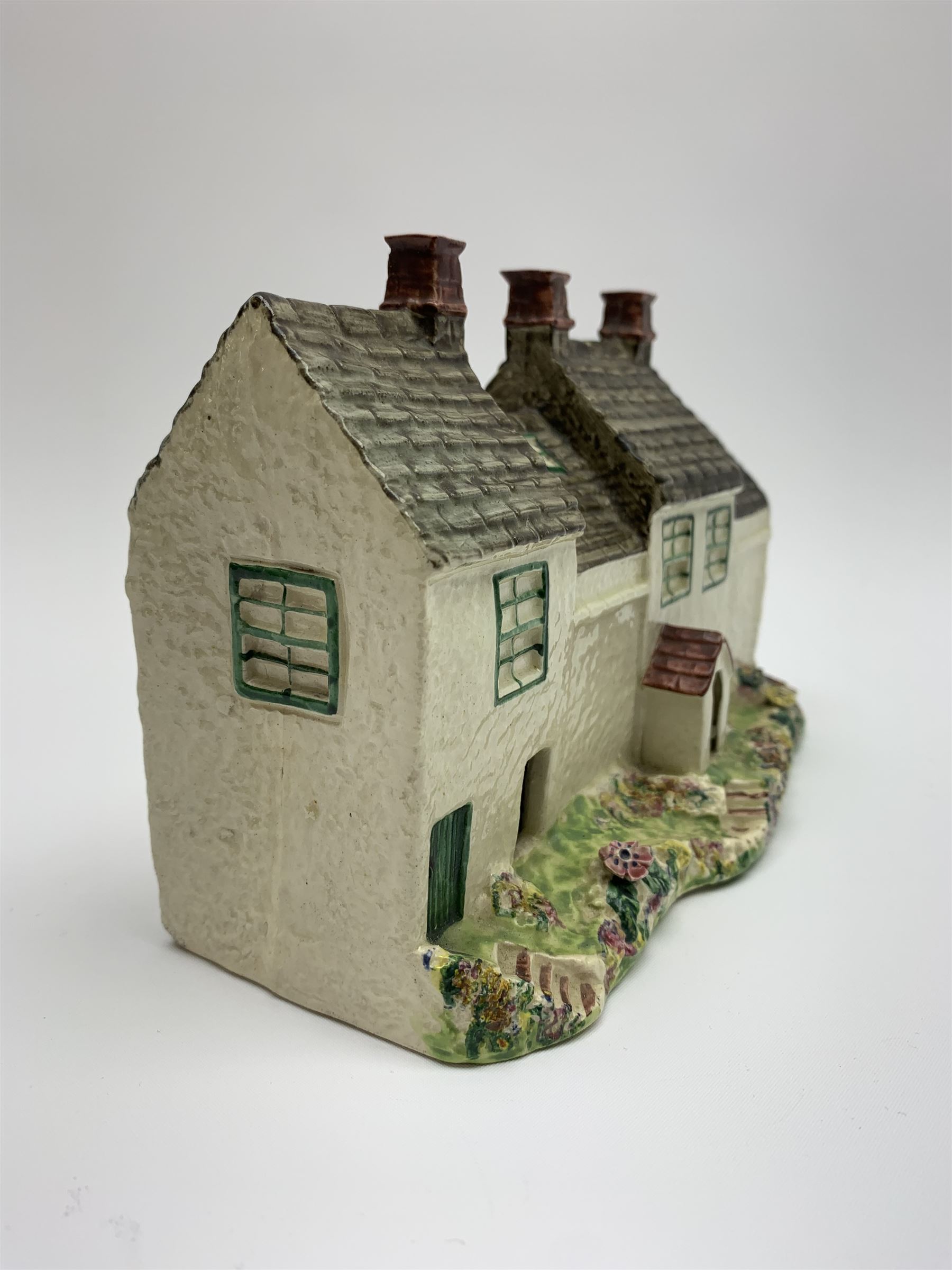 Leeds Pottery pastille burner modelled as two terrace cottages, with impressed mark beneath, H12cm L19cm