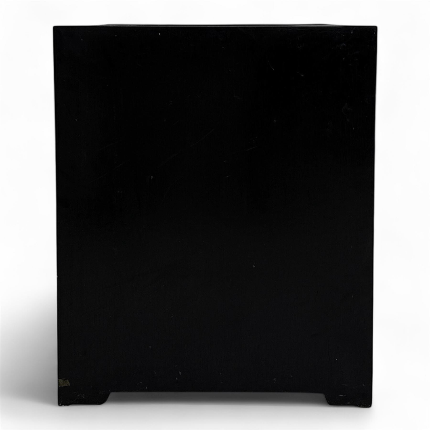 20th century Japanese Shibayama style black lacquered cabinet, rectangular form decorated with mother-of-pearl and hardstone figural inlay, the top with four standing figures, single frieze drawer above two cupboard doors, gilt painted borders and landscape