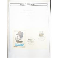 Mostly West German stamps, including stamps on covers, pairs and blocks, various postmarks, commemorative issues etc, housed in four ring binder folders