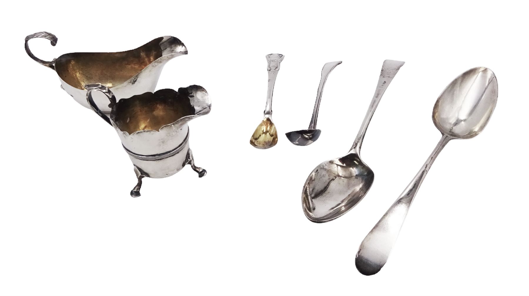 Pair of Georgian silver Old English pattern spoons, hallmarked Thomas Wallis II, London 1791, together with a silver sauce boat, silver cream jug and two other silver spoons, all hallmarked 