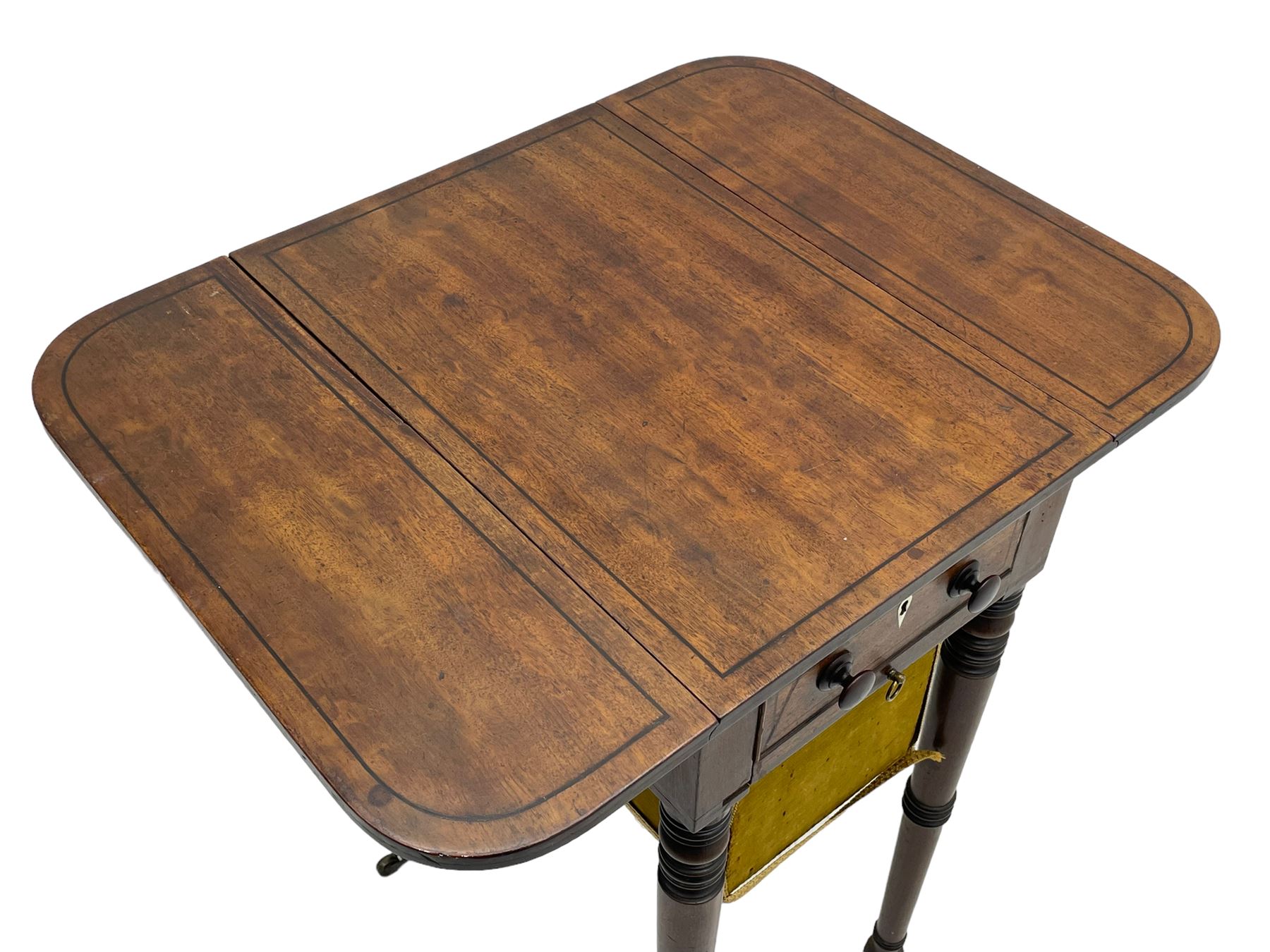 Narrow George III mahogany sewing or work Pembroke table, drop-leaf rectangular top with rounded corners inlaid with ebony stringing, fitted with single full-length cock-beaded drawer and opposing false drawer fascia, turned handles and ivory escutcheons, sliding upholstered storage bag beneath, on ring turned supports with brass cups and castors

This item has been registered for sale under Section 10 of the APHA Ivory Act