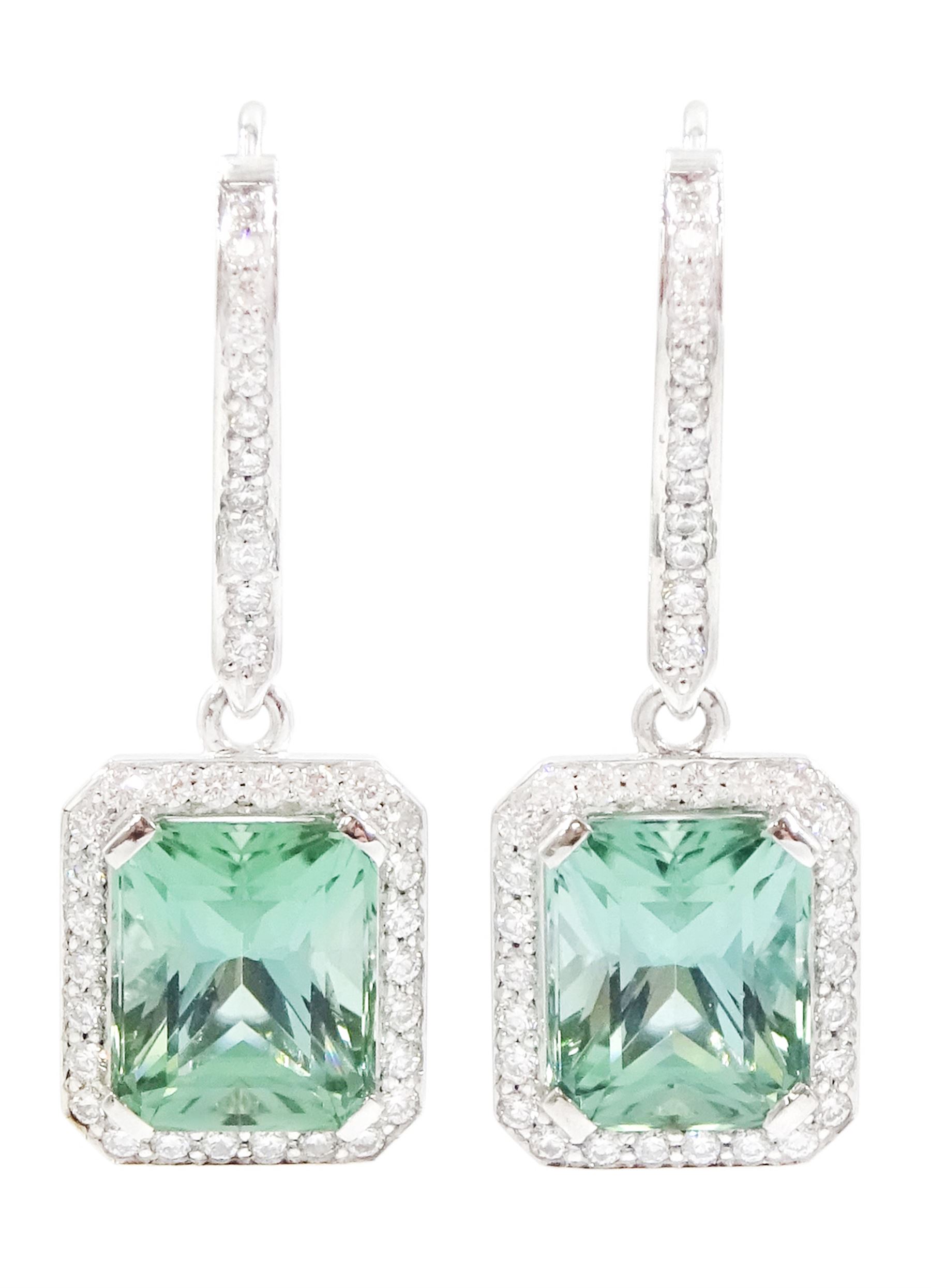 Pair of platinum African Paraiba tourmaline and diamond earrings by Scarab London, each pendant set with a modified octagonal cut tourmaline, surrounded by round brilliant cut diamonds and diamond set bail, London 2022, total tourmaline weight approx 6.12 carat, total diamond weight approx 0.74 carat, with Alan Poultney Gems report