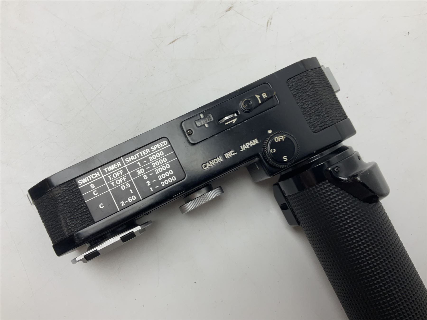 Collection of Canon lenses, to include 'Canon Lens FD 100mm 1:2.8', serial no 12821, 'Canon Lens FD 200mm 1:4' serial no 245313, 'Macro Canon Lens FL 50mm 1:3.5', serial no. 25505, 'Canon Lens FD 135mm 1:3.5 etc, together with other Canon equipment, including Bellows FL, Slide Duplicator etc 