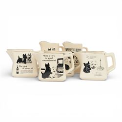 Eight Black and White Scotch Whisky advertising jugs