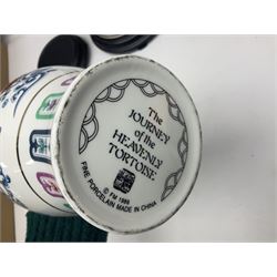 Franklin Mint Chinese style ceramics, comprising two vases, puppy and a planter, all on wooden stands