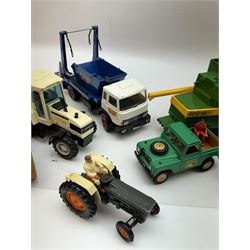 Collection of predominantly late 1970s/early 1980s Britains diecast vehicles and farming equipment, including Corn King, tractors, JCBs, horsebox, skip lorry, etc together with figures and accessories