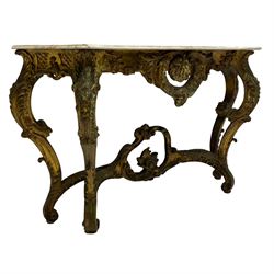 French Rococo design console or pier table, shaped and moulded pale marble top, the apron carved with pierced shell and scrolling acanthus leaves, extending flower head decoration, on four acanthus carved cabriole supports with scrolled terminals, united by shell moulded stretcher rails with central scrolled foliage cartouche 