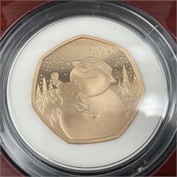 The Royal Mint United Kingdom 2021 'The Snowman and The Snowdog' gold proof fifty pence coin, cased with certificate