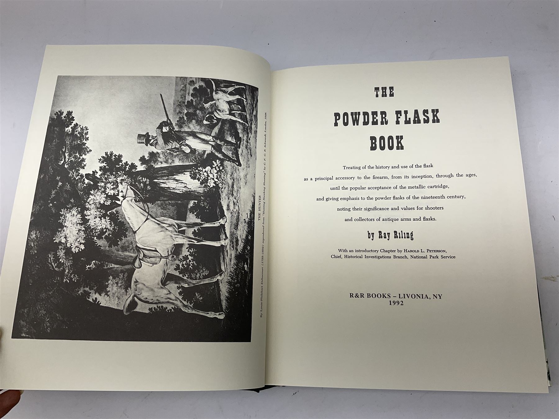 Riling Ray: The Powder Flask Book. 1992 R&R Books facsimile edition of the 1953 original; four powder measures including two by G. & J.W. Hawksley with horn handles; 16-bore combined spent cartridge and broken case remover; and turnscrew screw-driver (7)