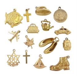 Fourteen 9ct gold pendant / charms including pair of ballet shoes, boot, car, barrel and boat and a 14ct gold star charm