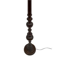 20th century walnut standard lamp, turned column on circular base, with shade 