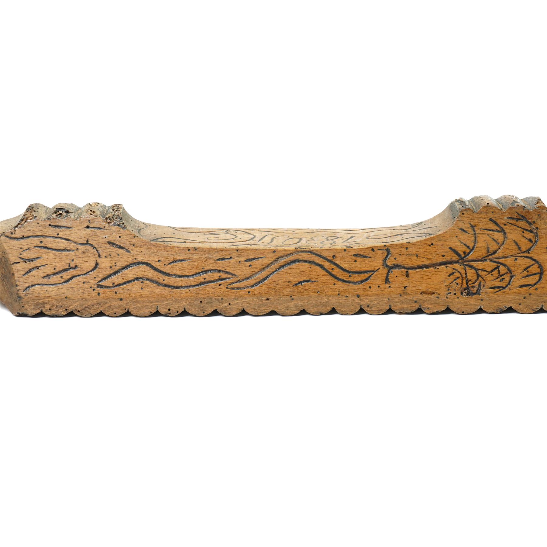 19th century treen mangle board, incised date 1830, decorated with various foliage, W70cm 