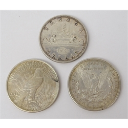  United States of America 1921 Morgan Dollar, 1925 Peace Dollar and a Canadian 1961 Dollar (3)  