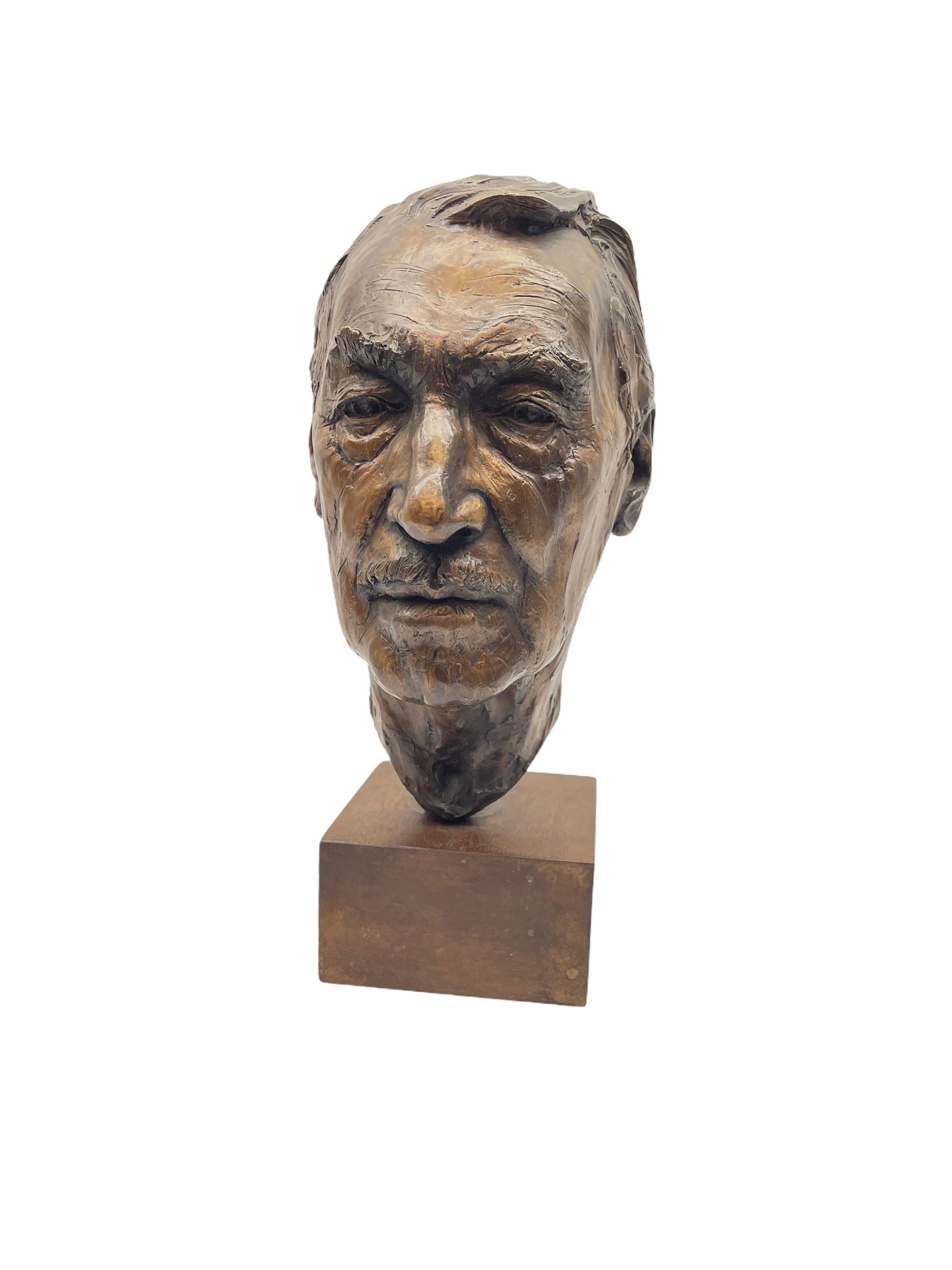 Anne Curry (French 1943-): Bronze bust modelled after the artist's late Grandfather, signed and dated '95 and numbered 1/5 on square wooden plinth, H41cm overall. Provenance: This piece was a gift from the artist's father to the vendors late mother in law. The portrait depicts the artist's late Grandfather who was a friend of the family