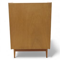 Golden Key By Palatial Ltd - mid-20th century teak chest of five drawers, rectangular top over a bank of graduating drawers fitted with brass loop handles, raised on tapering support