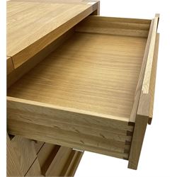 Light oak chest, fitted with four drawers