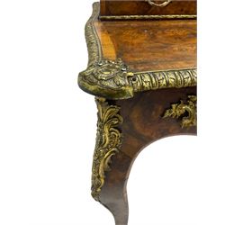 Late 19th to early 20th century French figured walnut writing desk, raised back fitted with drawers, shaped top with Kingwood banding and foliage cast edge moulding, fitted with single drawer, on cabriole supports mounted by shell and flower head cartouches 