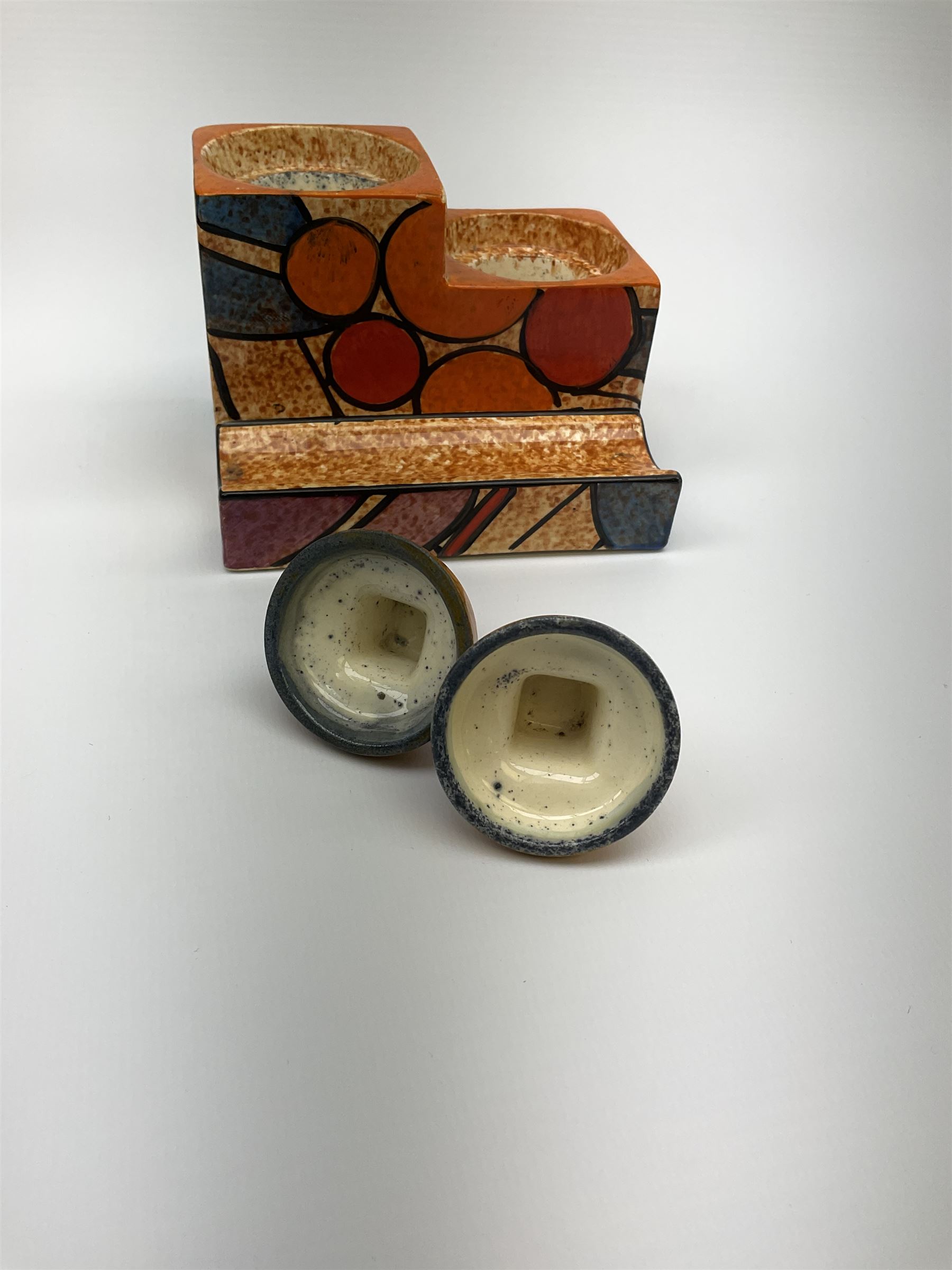 A Clarice Cliff Bizarre Cafe au lait double cube inkwell with pen tray, decorated in the Berries pattern, with printed mark to base, and shape number 462, H7cm W10cm. 