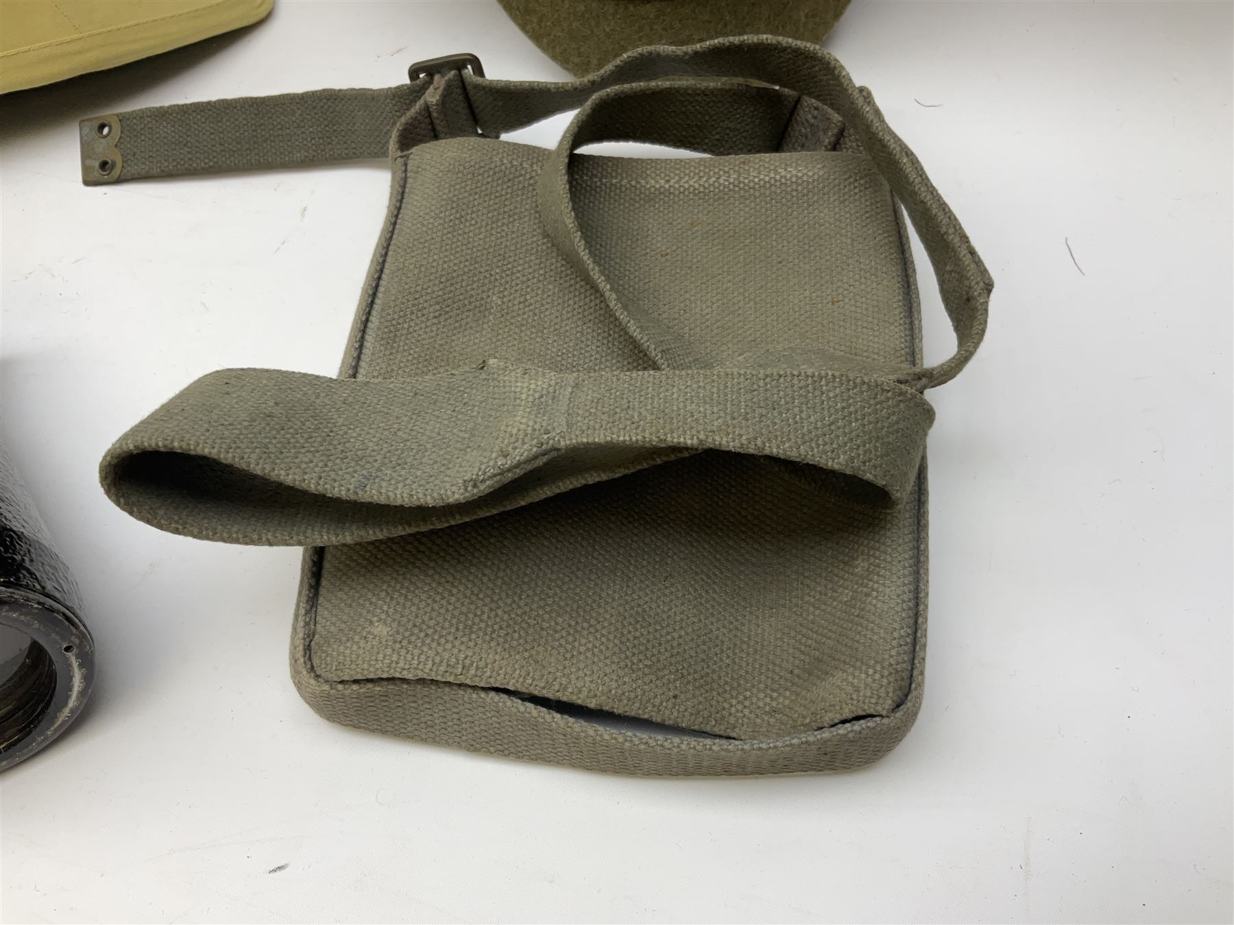Early 20th century British army peaked cap with Scots Guards brass badge; another later with Scots Guards Staybrite badge; modern pith helmet; British army water bottle with later webbing cover; pair of Carl Zeiss blc 7 x 50 binoculars; and Dunn & Co bowler hat