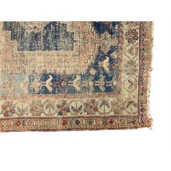 Antique Caucasian rug, indigo ground field decorated with three lozenge medallions within borders of stylised bird and flower head motifs