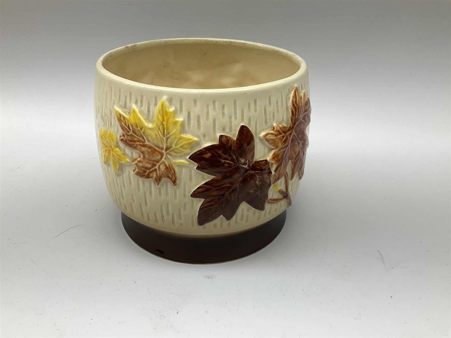 Two Royal Crown Derby pattern Imari soup bowls, pattern 2451, Belleek Fermanagh Ireland four piece set in green shamrock pattern, Royal Doulton small lady figure, Marie HN1370, large Wedgwood fruit bowl, Sylvac jardiniere in autumn leaves pattern, five pieces Co-operative Society commemorative ceramics, with selection of other ceramics. 