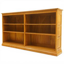 Beaverman -  Adzed oak open bookcase, with two sets of two adjustable shelves, panelled sides on a plinth base, with carved beaver signature, by Colin Almack of Sutton near Thirsk