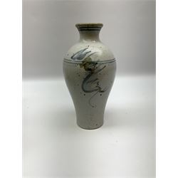 Studio pottery vase of baluster form with a light mottled blue ground with abstract painted decoration, H26cm