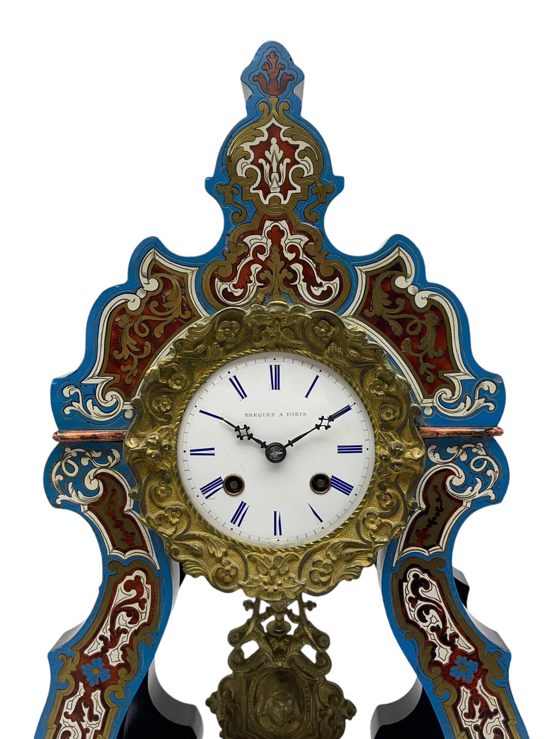 Breguet A Paris - Mid-19th century 8-day French portico clock, ebonised case with brass and cloisonne inlay, on a rectangular plinth with a shaped base, white enamel dial with blue Roman numerals, minute track and steel trefoil hands, cast brass bezel with scroll and foliate decoration and a conforming gridiron pendulum, twin train going barrel movement with a countwheel strike sounding the hours and half-hours on a bell, with an ebonised base and glass dome. 