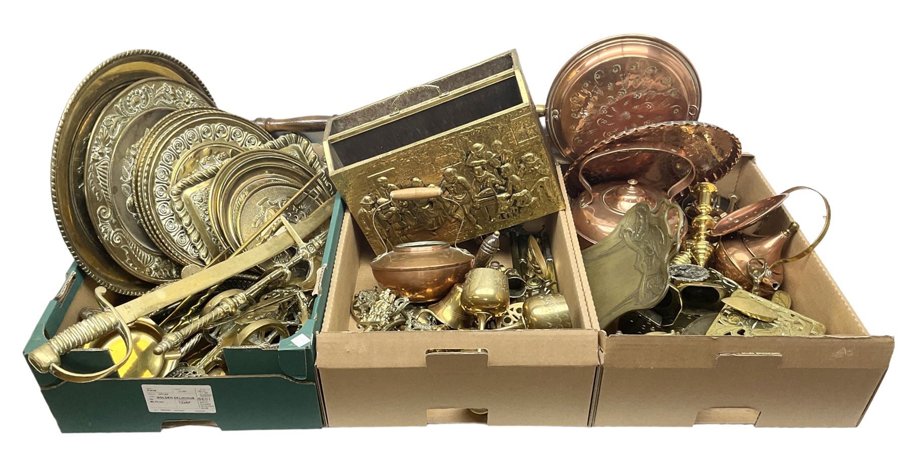 Quantity of copper pans and teapots, dish and sieve with pierced heart decoration and brass handle, together with quantity of brassware to include brass Art Nouveau crumb tray and brush, repousse chargers, fire tool accessories, decorative canon, sword and guns etc