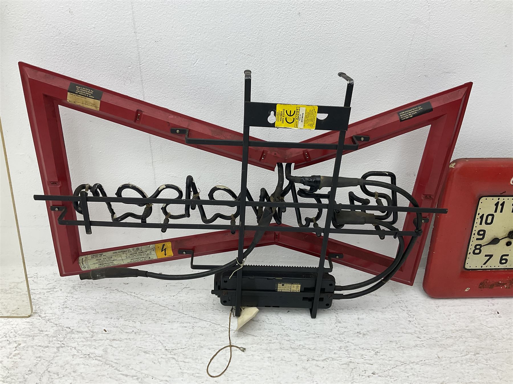 Electric neon Budweiser advertising sign, together with a Foster's example etc