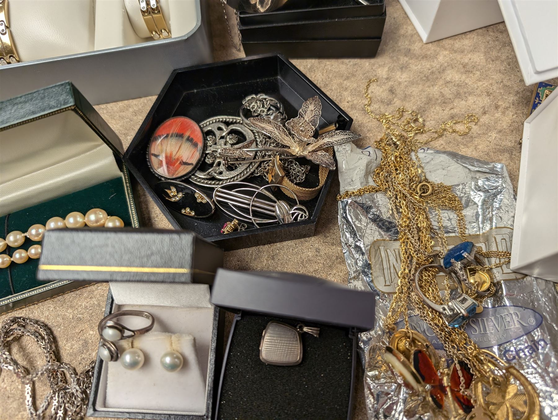 Collection of silver jewellery, including chains, brooches, bracelets and bangles, together with a collection of costume jewellery, two Skagen wristwatches and a Rotary Elite watch