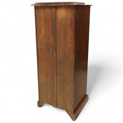 Victorian mahogany Wellington chest, the rectangular top above eight graduated drawers each fitted with turned knobs, flanked by hinged locking stiles, raised on a plinth base