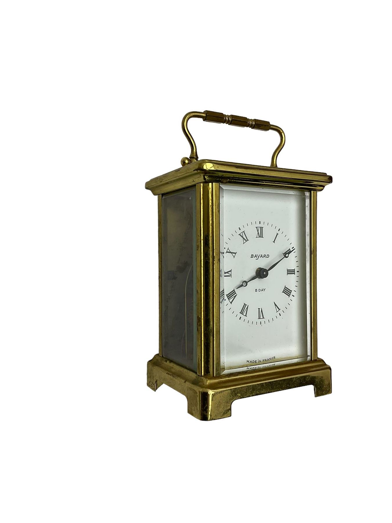  20th century French cornice “Bayard” 8-day timepiece carriage clock, with a lever platform escapement, enamel dial with roman numerals and minute track and Haller Torsion clock with acrylic dome
