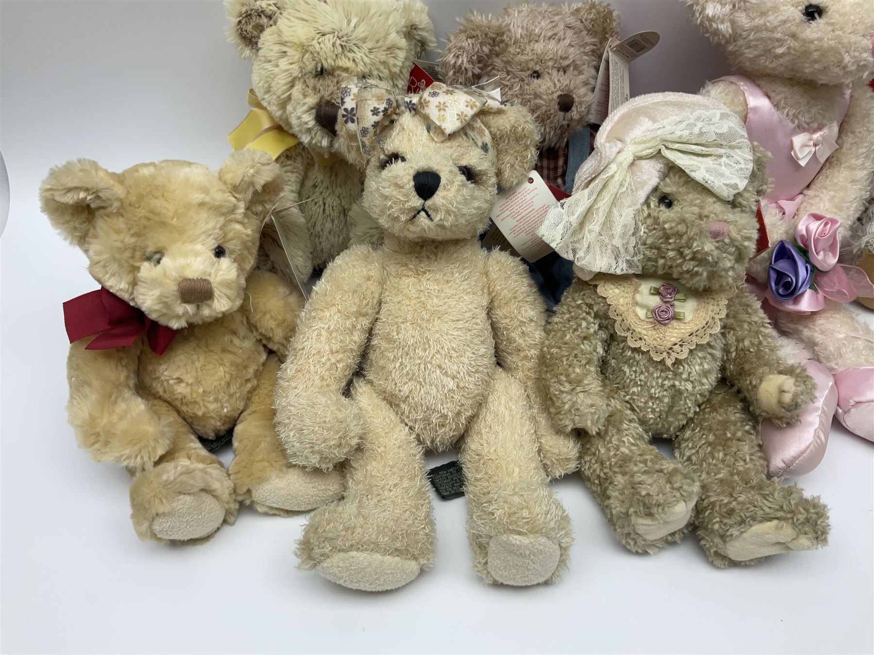 Eighteen Russ teddy bears including Ariella, Chloe, Spencer and Desmond,  mostly with tags, together with six other soft toys, tallest H42cm (24)
