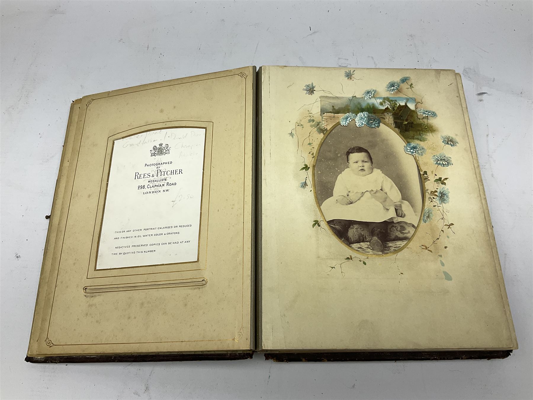 Victorian leather bound musical photo album, together with another victorian photo album, with photographs 
