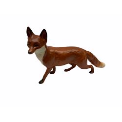 Beswick figures, comprising Afghan Hound 2285, St Bernard 'Corna Garth Stroller' 2221, Rottweiler 3056, Greatdane 'CH Ruler of Ouborough', Fox, Elephant, and dappled grey type horse. 