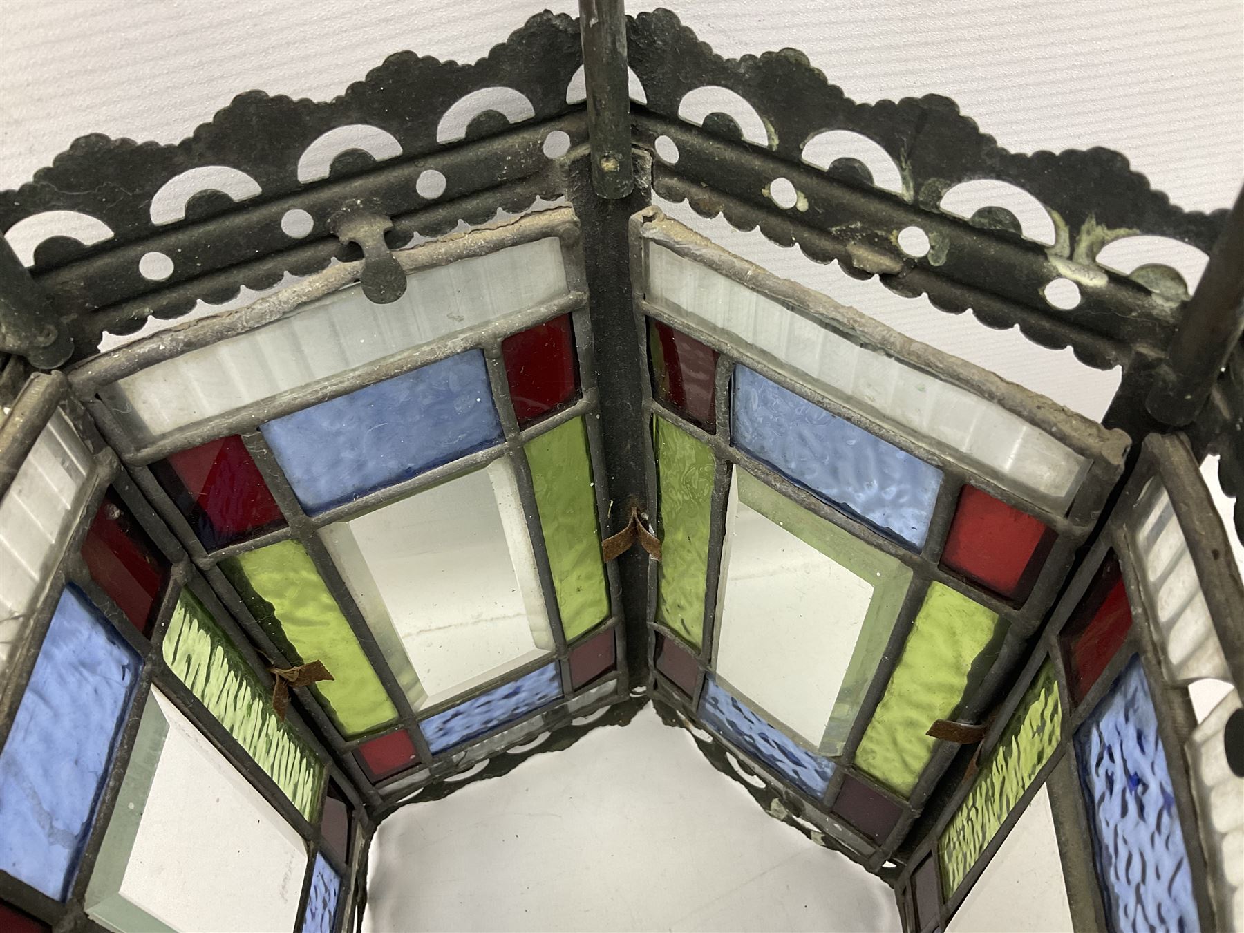 Victorian brass and stained leaded glass hall lantern, of hexagonal form, supported by four domed arms and pierced fret, H46cm W20cm