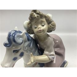 Three Lladro figures, Faithful Steed no 5769, Best Foot Forward no 5738 and Lambkins no 5469, all with original boxes, largest example H21cm 