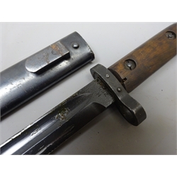  Czechoslovakian model 33/40 Mauser bayonet, the 30cm single edged fullered blued steel blade stamped to the ricasso CSZ over H, wooden slab grip stamped E3 46 with rampant lion, L43cm, in steel scabbard with matching stamp,   
