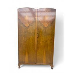 Ashton Leach & Cumberbirch Ltd., Rochdale - early 20th century walnut and mahogany gentleman's wardrobe, arched moulded top with book-matched figured walnut veneers, double doors enclosing fitted interior with hanging rail, tie rack and drawers, raised on cabriole supports