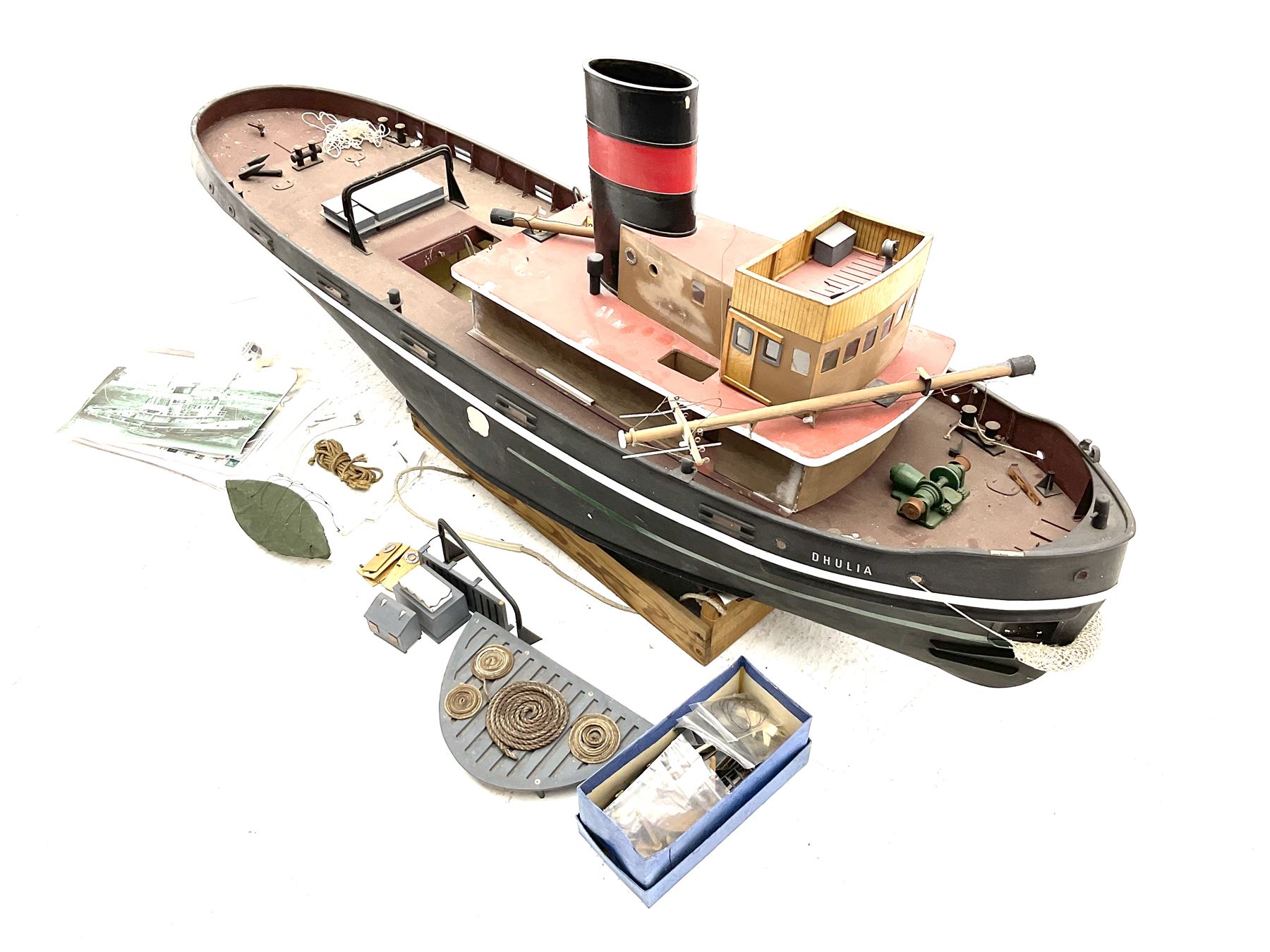 Large model of the tugboat 'Dhulia' on a wooden stand L144cm, together with a box of additional parts and plans