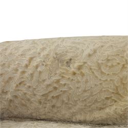 Late 20th century wingback armchair and matching footstool, upholstered in beige embossed fabric with brass stud edging, on cabriole legs and splayed rear legs, together with a matching footstool on turned supports terminating in brass castors (Stool H 42cm, W 75cm, D 47cm)